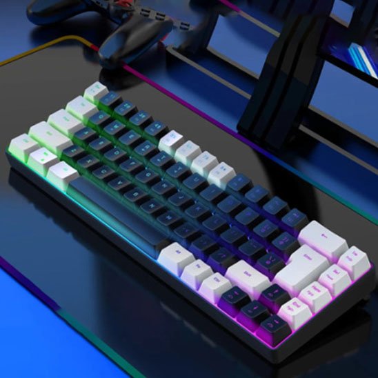 Clavier ergonomique gaming compact compact avec touches blanches sur les côtés et touches noires au centre, rétroéclairage.